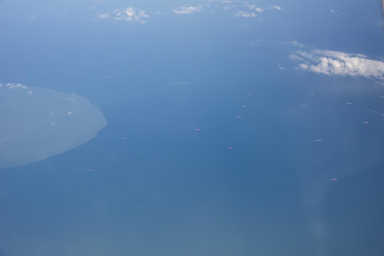 The Gulf of Mexico as seen from NASA photographer Carla Thomas at high altitude in the F/A-18 research aircraft during a flight in support of the Quiet Supersonic Flights 2018 series, or QSF18. The high altitude is necessary as part of the quiet supersonic dive maneuver, climbing to around 50,000 feet, followed by a supersonic, inverted dive. This creates sonic boom shockwaves in a way that they are quieter in a specific area.