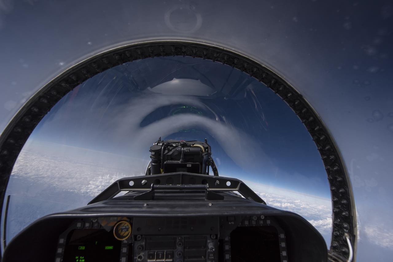 NASA test pilots perform the quiet supersonic dive maneuver off the coast of Galveston, Texas to create a quieter version of the sonic boom, in order to obtain recruited community survey feedback data. The test pilot climbs to around 50,000 feet, followed by a supersonic, inverted dive. This creates sonic boom shockwaves in a way that they are quieter in a specific area. Meanwhile, NASA researchers match community feedback to the sound levels of the flights, using an electronic survey and microphone monitor stations on the ground. This is preparing NASA for community response models for the future X-59 QueSST.