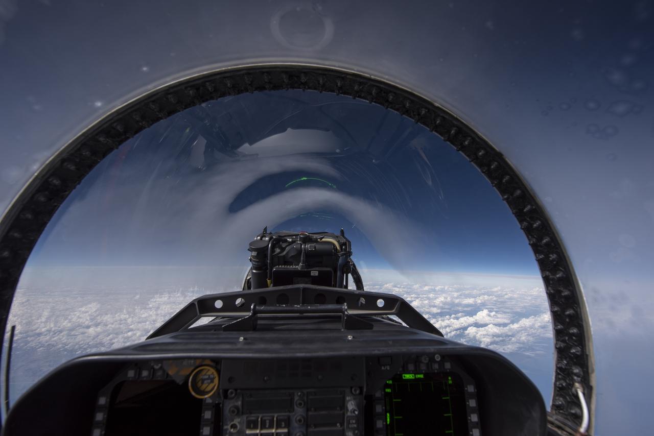 NASA test pilots perform the quiet supersonic dive maneuver off the coast of Galveston, Texas to create a quieter version of the sonic boom, in order to obtain recruited community survey feedback data. The test pilot climbs to around 50,000 feet, followed by a supersonic, inverted dive. This creates sonic boom shockwaves in a way that they are quieter in a specific area. Meanwhile, NASA researchers match community feedback to the sound levels of the flights, using an electronic survey and microphone monitor stations on the ground. This is preparing NASA for community response models for the future X-59 QueSST.