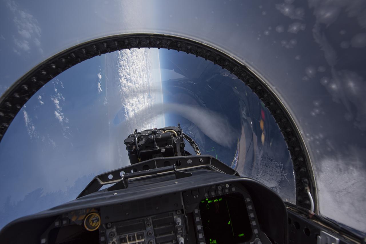 NASA test pilots perform the quiet supersonic dive maneuver off the coast of Galveston, Texas to create a quieter version of the sonic boom, in order to obtain recruited community survey feedback data. The test pilot climbs to around 50,000 feet, followed by a supersonic, inverted dive. This creates sonic boom shockwaves in a way that they are quieter in a specific area. Meanwhile, NASA researchers match community feedback to the sound levels of the flights, using an electronic survey and microphone monitor stations on the ground. This is preparing NASA for community response models for the future X-59 QueSST.