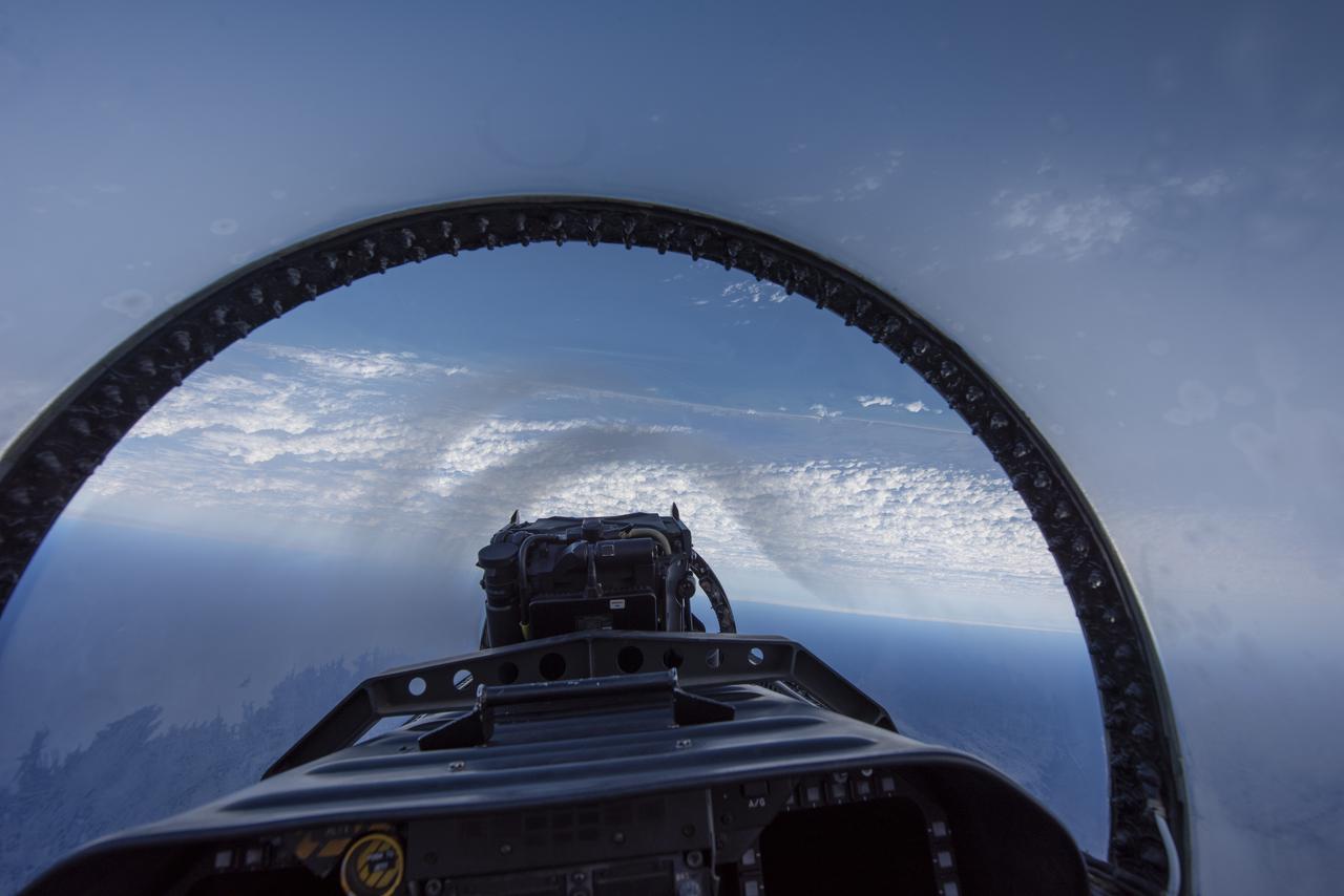 NASA test pilots perform the quiet supersonic dive maneuver off the coast of Galveston, Texas to create a quieter version of the sonic boom, in order to obtain recruited community survey feedback data. The test pilot climbs to around 50,000 feet, followed by a supersonic, inverted dive. This creates sonic boom shockwaves in a way that they are quieter in a specific area. Meanwhile, NASA researchers match community feedback to the sound levels of the flights, using an electronic survey and microphone monitor stations on the ground. This is preparing NASA for community response models for the future X-59 QueSST.