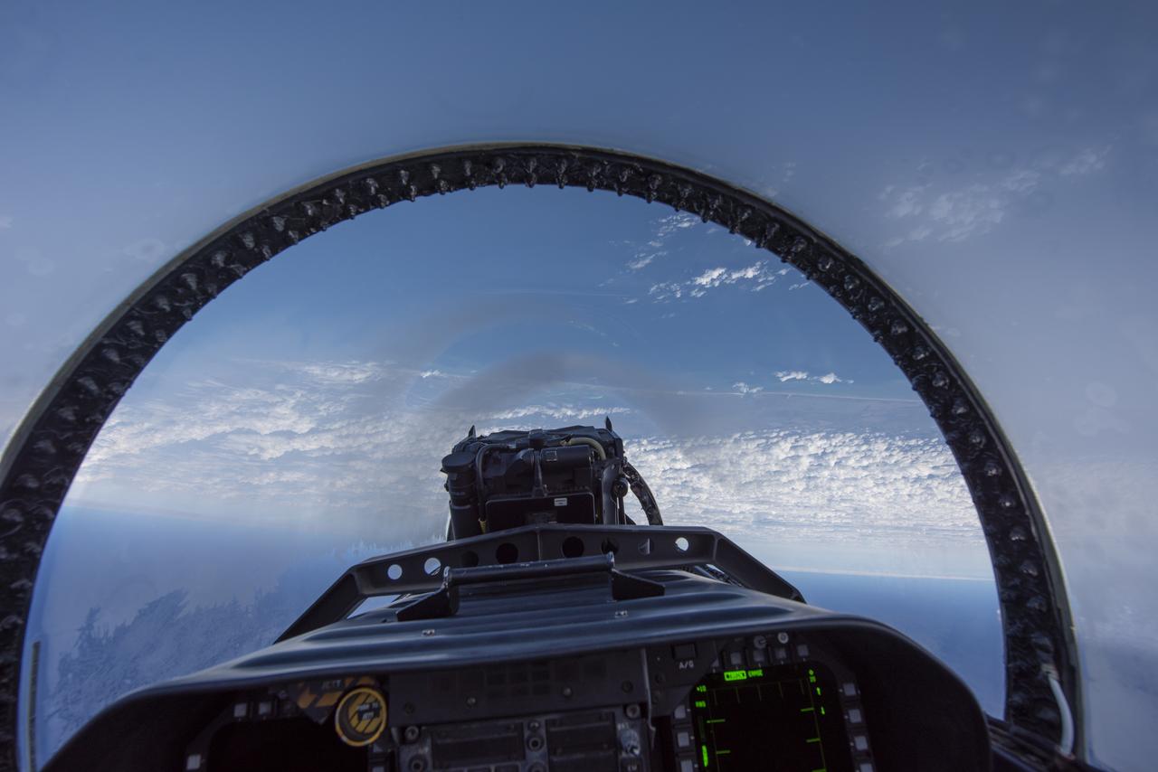 NASA test pilots perform the quiet supersonic dive maneuver off the coast of Galveston, Texas to create a quieter version of the sonic boom, in order to obtain recruited community survey feedback data. The test pilot climbs to around 50,000 feet, followed by a supersonic, inverted dive. This creates sonic boom shockwaves in a way that they are quieter in a specific area. Meanwhile, NASA researchers match community feedback to the sound levels of the flights, using an electronic survey and microphone monitor stations on the ground. This is preparing NASA for community response models for the future X-59 QueSST.
