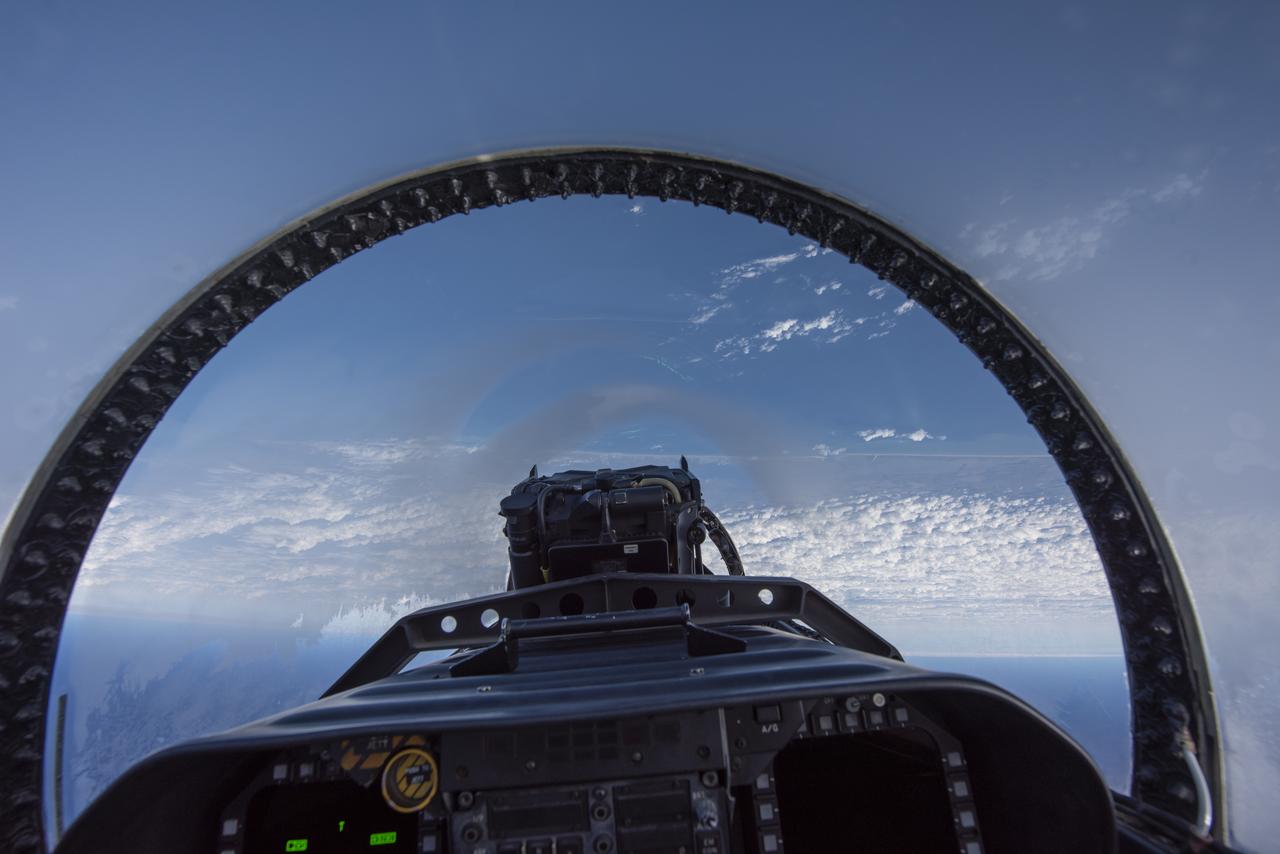 NASA test pilots perform the quiet supersonic dive maneuver off the coast of Galveston, Texas to create a quieter version of the sonic boom, in order to obtain recruited community survey feedback data. The test pilot climbs to around 50,000 feet, followed by a supersonic, inverted dive. This creates sonic boom shockwaves in a way that they are quieter in a specific area. Meanwhile, NASA researchers match community feedback to the sound levels of the flights, using an electronic survey and microphone monitor stations on the ground. This is preparing NASA for community response models for the future X-59 QueSST.