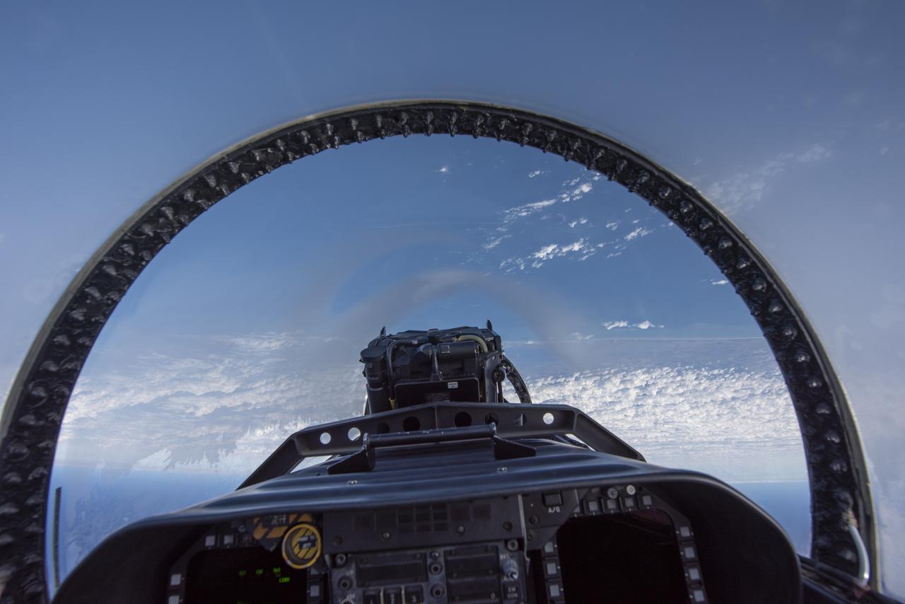 NASA test pilots perform the quiet supersonic dive maneuver off the coast of Galveston, Texas to create a quieter version of the sonic boom, in order to obtain recruited community survey feedback data. The test pilot climbs to around 50,000 feet, followed by a supersonic, inverted dive. This creates sonic boom shockwaves in a way that they are quieter in a specific area. Meanwhile, NASA researchers match community feedback to the sound levels of the flights, using an electronic survey and microphone monitor stations on the ground. This is preparing NASA for community response models for the future X-59 QueSST.