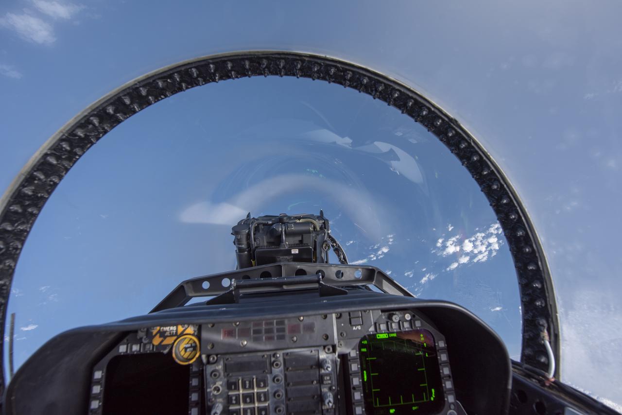 NASA test pilots perform the quiet supersonic dive maneuver off the coast of Galveston, Texas to create a quieter version of the sonic boom, in order to obtain recruited community survey feedback data. The test pilot climbs to around 50,000 feet, followed by a supersonic, inverted dive. This creates sonic boom shockwaves in a way that they are quieter in a specific area. Meanwhile, NASA researchers match community feedback to the sound levels of the flights, using an electronic survey and microphone monitor stations on the ground. This is preparing NASA for community response models for the future X-59 QueSST.