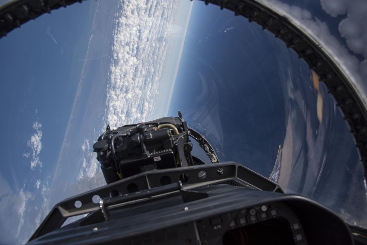 NASA test pilots perform the quiet supersonic dive maneuver off the coast of Galveston, Texas to create a quieter version of the sonic boom, in order to obtain recruited community survey feedback data. The test pilot climbs to around 50,000 feet, followed by a supersonic, inverted dive. This creates sonic boom shockwaves in a way that they are quieter in a specific area. Meanwhile, NASA researchers match community feedback to the sound levels of the flights, using an electronic survey and microphone monitor stations on the ground. This is preparing NASA for community response models for the future X-59 QueSST.