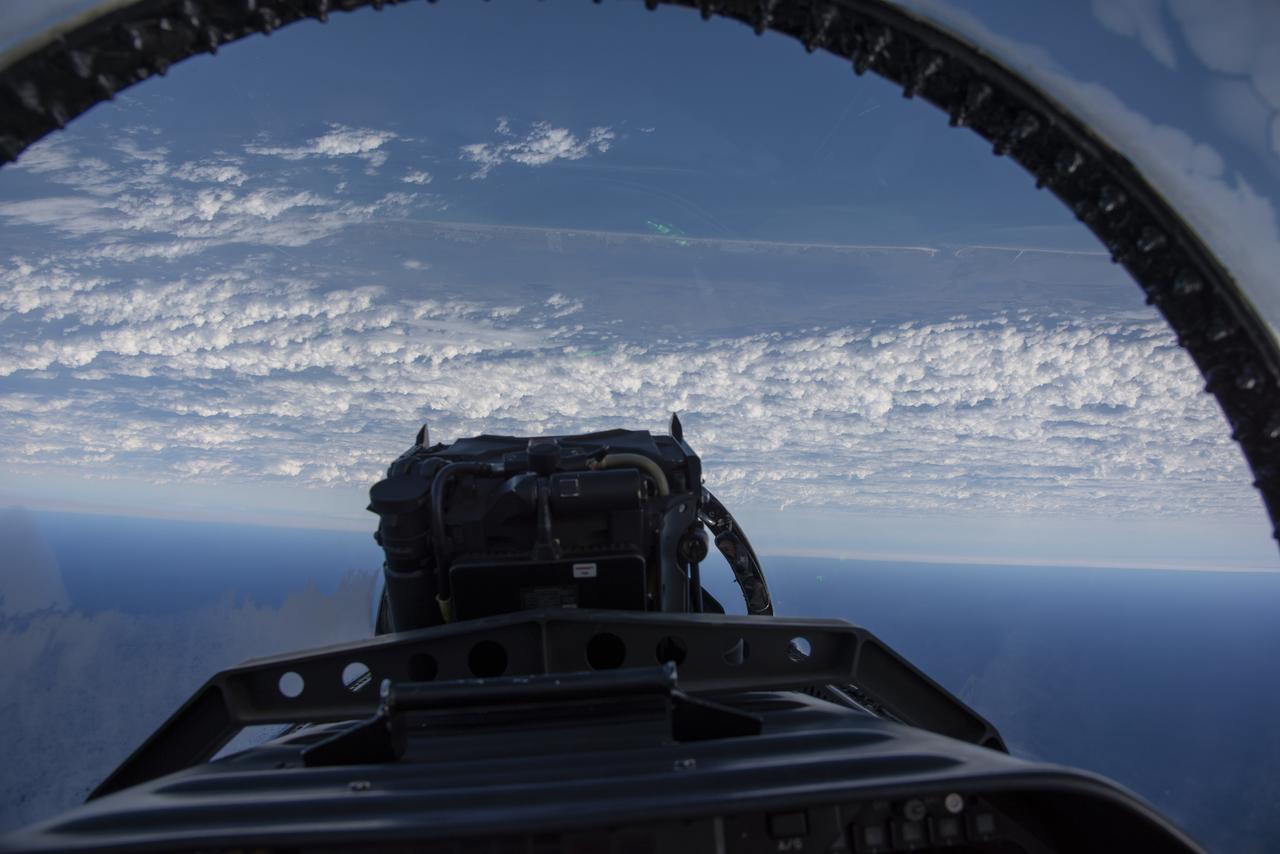 NASA test pilots perform the quiet supersonic dive maneuver off the coast of Galveston, Texas to create a quieter version of the sonic boom, in order to obtain recruited community survey feedback data. The test pilot climbs to around 50,000 feet, followed by a supersonic, inverted dive. This creates sonic boom shockwaves in a way that they are quieter in a specific area. Meanwhile, NASA researchers match community feedback to the sound levels of the flights, using an electronic survey and microphone monitor stations on the ground. This is preparing NASA for community response models for the future X-59 QueSST.