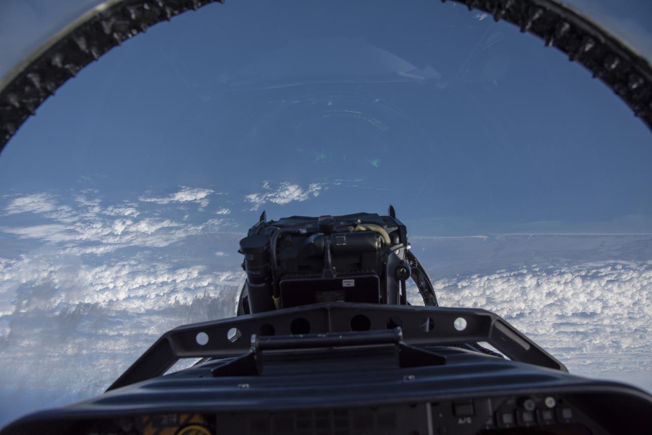 NASA test pilots perform the quiet supersonic dive maneuver off the coast of Galveston, Texas to create a quieter version of the sonic boom, in order to obtain recruited community survey feedback data. The test pilot climbs to around 50,000 feet, followed by a supersonic, inverted dive. This creates sonic boom shockwaves in a way that they are quieter in a specific area. Meanwhile, NASA researchers match community feedback to the sound levels of the flights, using an electronic survey and microphone monitor stations on the ground. This is preparing NASA for community response models for the future X-59 QueSST.