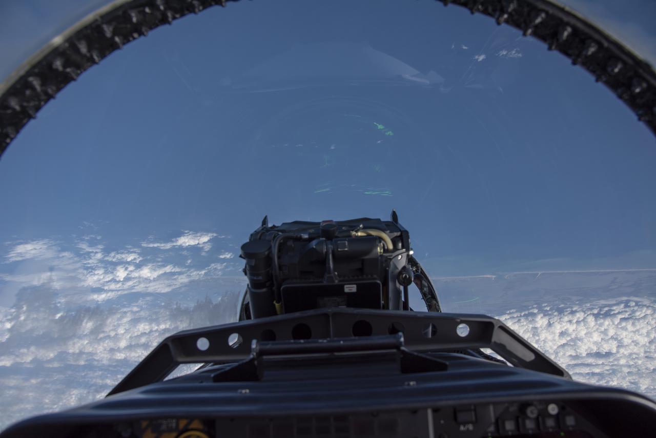 NASA test pilots perform the quiet supersonic dive maneuver off the coast of Galveston, Texas to create a quieter version of the sonic boom, in order to obtain recruited community survey feedback data. The test pilot climbs to around 50,000 feet, followed by a supersonic, inverted dive. This creates sonic boom shockwaves in a way that they are quieter in a specific area. Meanwhile, NASA researchers match community feedback to the sound levels of the flights, using an electronic survey and microphone monitor stations on the ground. This is preparing NASA for community response models for the future X-59 QueSST.