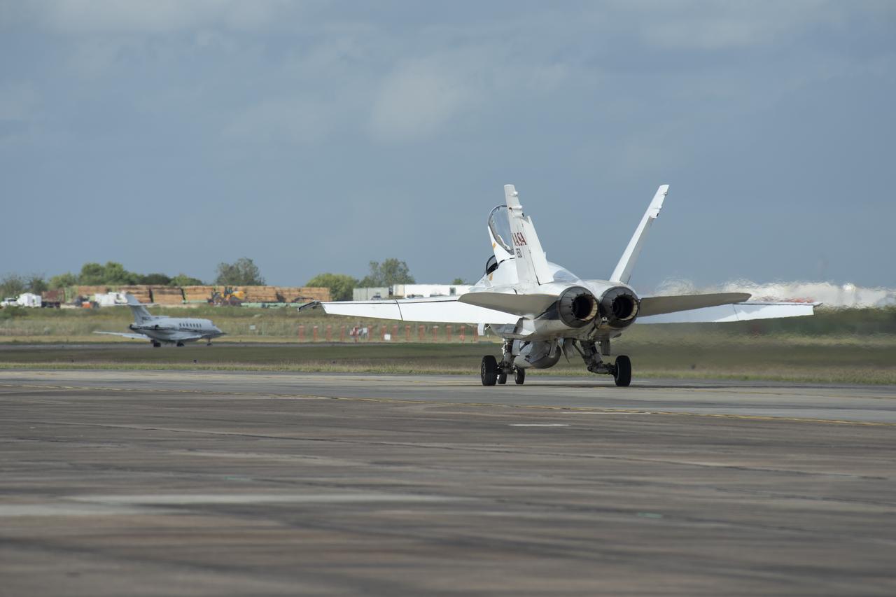 NASA's F/A-18 research aircraft takes off from Ellington Field in Houston, Texas for a quiet supersonic research flight off the coast of Galveston, as part of the QSF18 flight series. The F/A-18 will climb to 50,000 feet over the Gulf of Mexico, where it will perform the quiet supersonic dive maneuver.