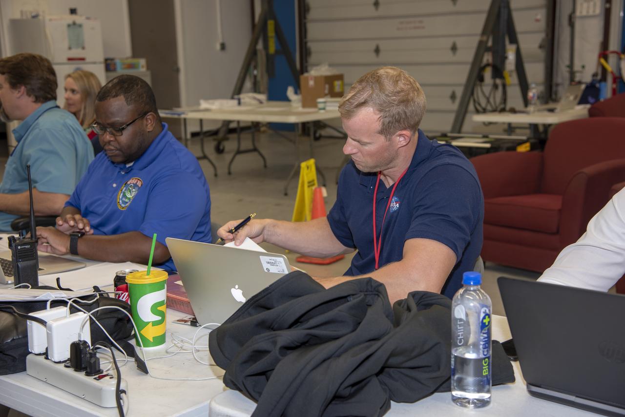 NASA mission controllers, engineers, pilots and communications specialists in the mission control room monitor the supersonic research flight off the coast of Galveston, as part of the QSF18 flight series. The flight operations crew tracks the status of the flights, maintains communications with the aircraft, communicates with U.S. Coast Guard, and coordinates community feedback data.