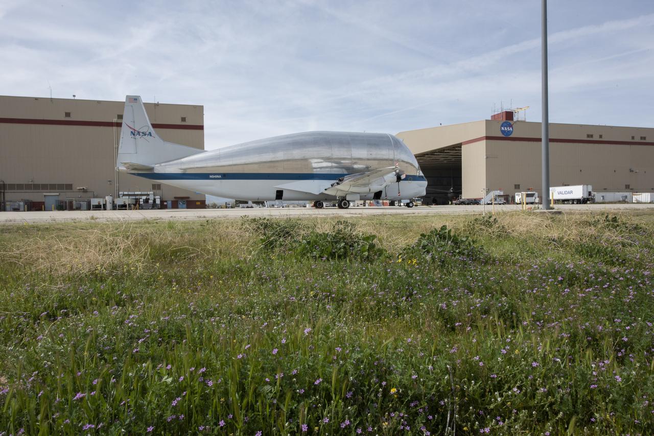 NASA’s Super Guppy cargo transport aircraft parked on the ramp in front of NASA’s Armstrong Flight Research Center Building 703. 