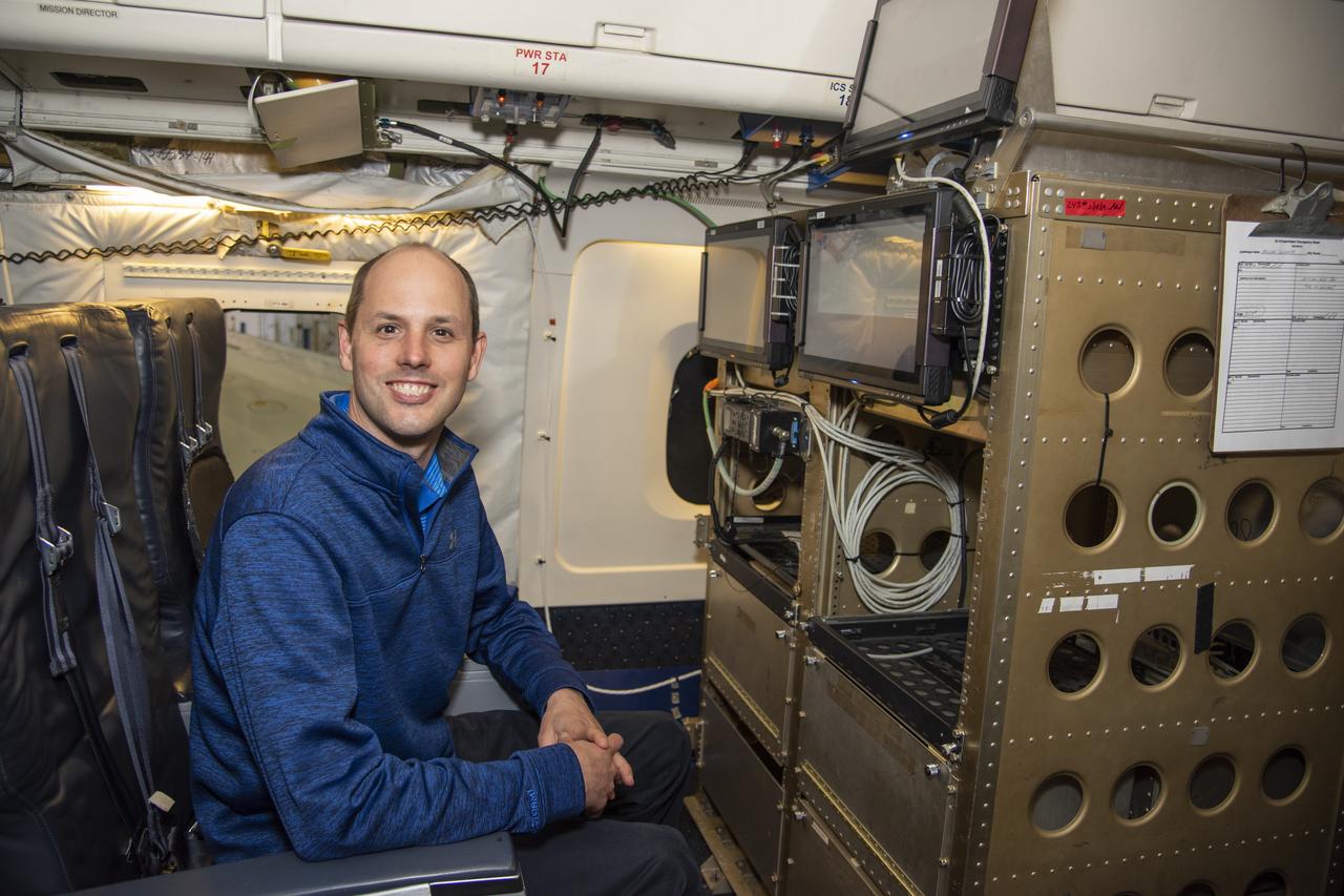 NASA Langley Research Center's Kris Bedka, pictured here on the DC-8 flying laboratory, is the lead for an airborne mission called Aeoulus that is advancing laser-based technologies for measuring winds in the lower atmosphere.