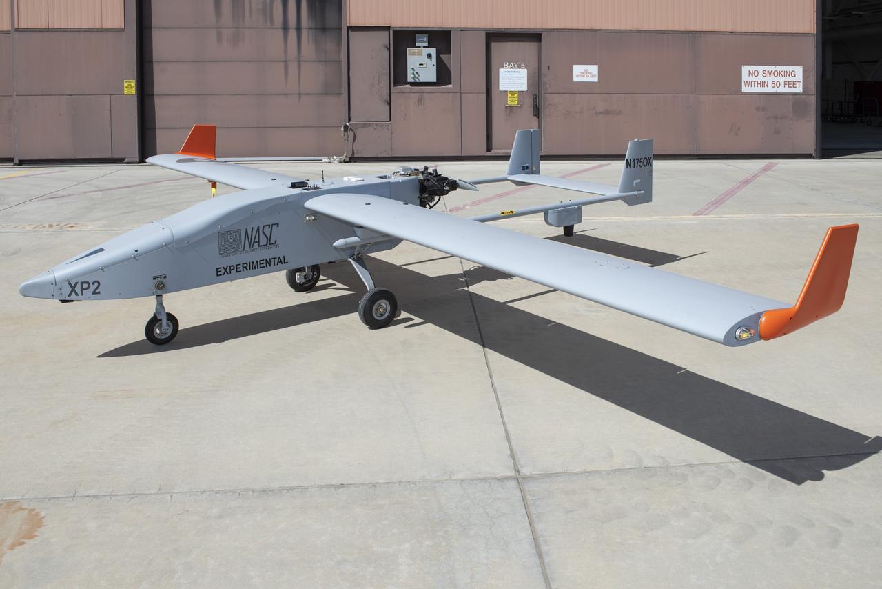 The fully assembled TigerShark unmanned aircraft system, seen here near a hangar at NASA’s Armstrong Flight Research Center in California, is expected to soon be flying missions.