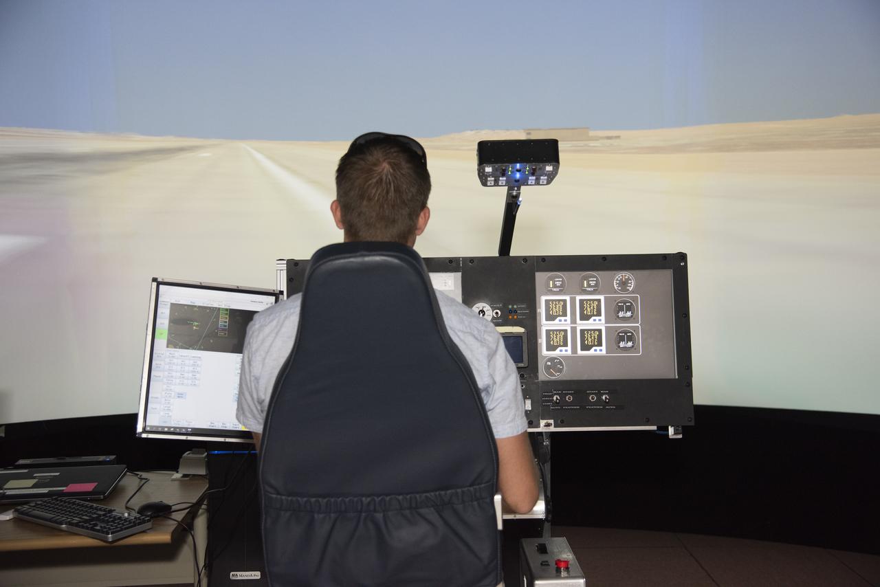 NASA's 2017 astronaut candidate Matthew Dominick practices flying in the X-57 aircraft simulator at Armstrong Flight Research Center in Southern California. Starting with the fuselage of a Tecnam P20067T, the X-57 Maxwell electric propulsion airplane is being built from ideas being researched that could lead to the development of electric propulsion-powered aircraft, which would be quieter, more efficient and environmentally friendly than today's commuter aircraft.