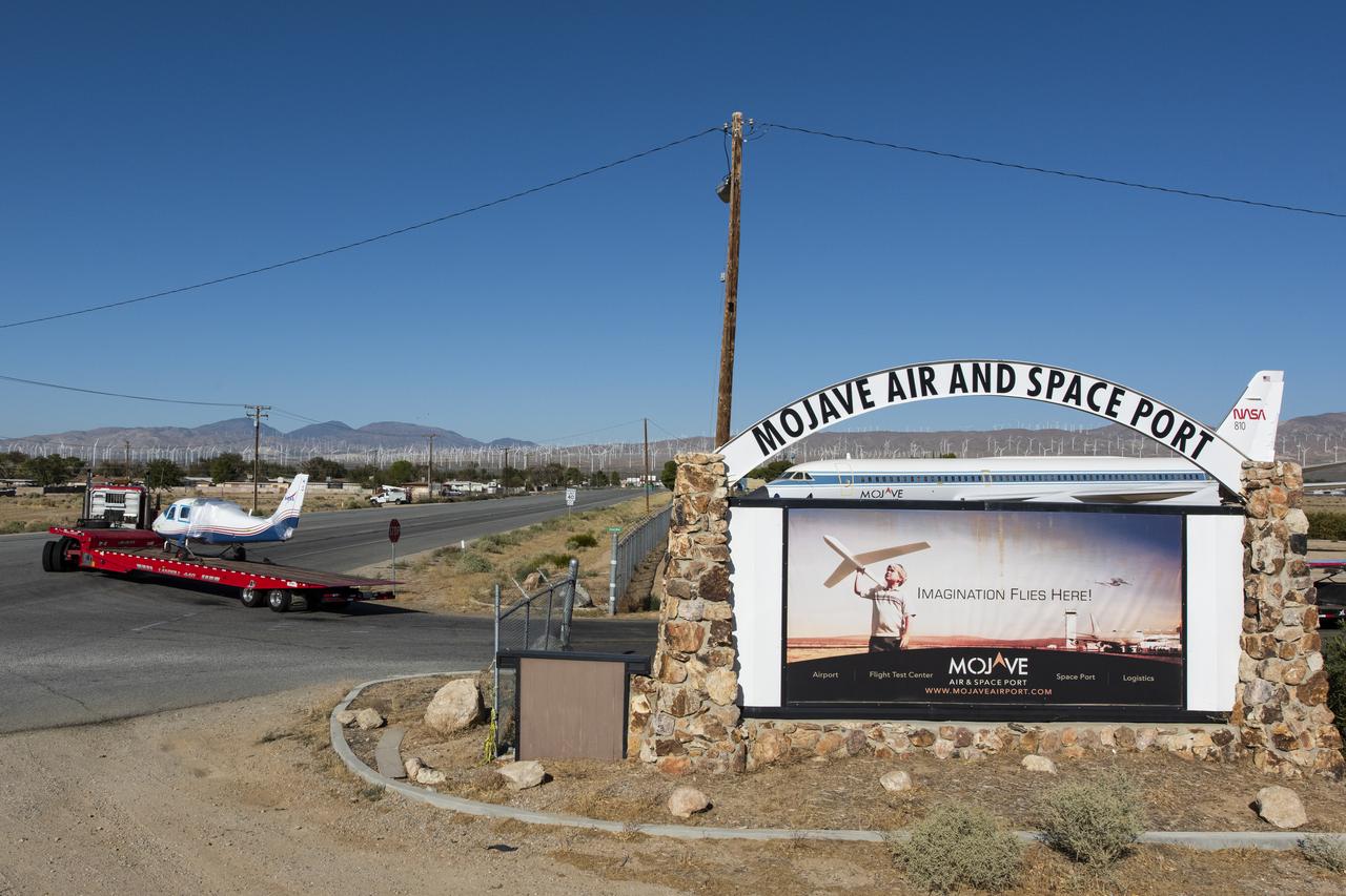 NASA’s all-electric X-57 Maxwell, in its Mod II configuration, departs Scaled Composites’ facility at Mojave Air and Space Port, en route to NASA’s Armstrong Flight Research Center in Edwards, California for delivery. The aircraft, shipped as two parts – the fuselage and the wing – was delivered to NASA Armstrong’s Research Aircraft Integration Facility, where it will be reintegrated to begin ground tests, to be followed by taxi tests, and eventually, flight tests. X-57’s Mod II configuration, the first of three primary modifications for the project, involves testing of the aircraft’s cruise electric propulsion system. The goal of the X-57 project is to share the aircraft’s electric-propulsion-focused design and airworthiness process with regulators, to advance certification approaches for distributed electric propulsion in general aviation.
