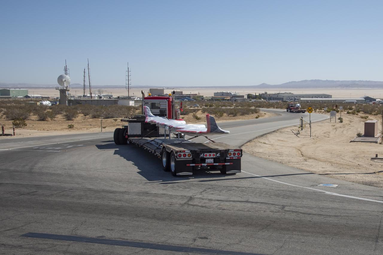 NASA’s all-electric X-57 Maxwell, in its Mod II configuration, arrives at NASA’s Armstrong Flight Research Center in Edwards, California. The X-plane was delivered by prime contractor Empirical Systems Aerospace of San Luis Obispo, California, in two parts, with the wing separated from the fuselage, to aid in a more timely delivery. X-57 is NASA’s first crewed X-plane in two decades, and seeks to further advance the design and airworthiness process for distributed electric propulsion technology for general aviation aircraft.