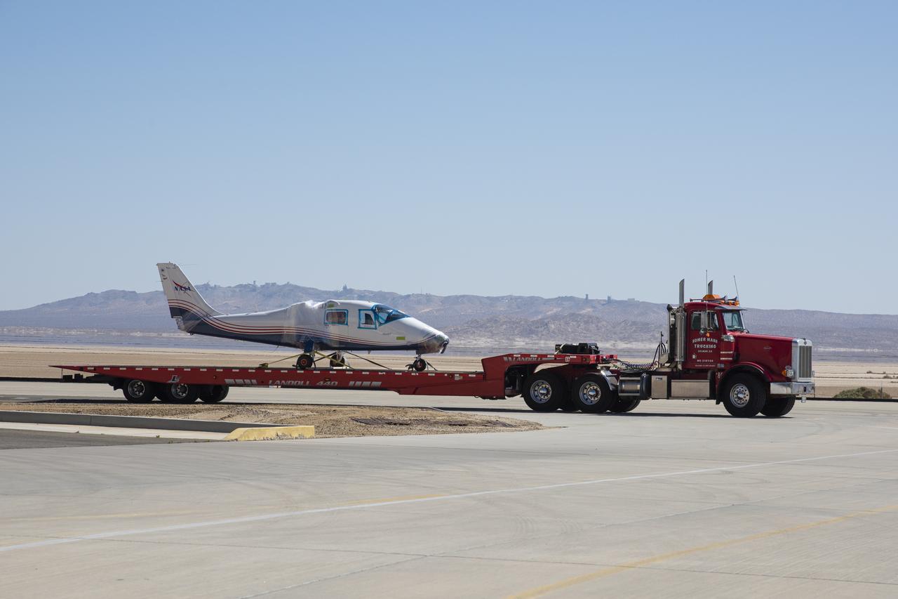 NASA’s all-electric X-57 Maxwell, in its Mod II configuration, arrives at NASA’s Armstrong Flight Research Center in Edwards, California. The X-plane was delivered by prime contractor Empirical Systems Aerospace of San Luis Obispo, California, in two parts, with the wing separated from the fuselage, to aid in a more timely delivery. X-57 is NASA’s first crewed X-plane in two decades, and seeks to further advance the design and airworthiness process for distributed electric propulsion technology for general aviation aircraft.