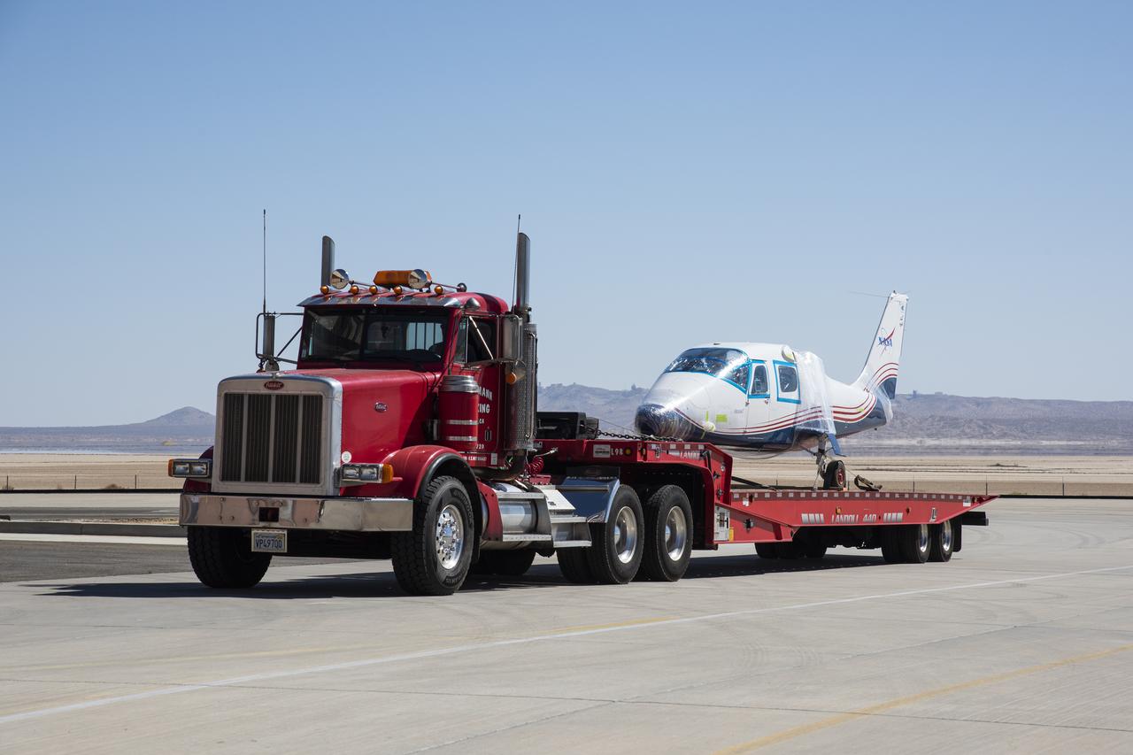 NASA's all-electric X-57 Maxwell, in its Mod II configuration, arrives at NASA's Armstrong Flight Research Center in Edwards, California. The X-plane was delivered by prime contractor Empirical Systems Aerospace of San Luis Obispo, California, in two parts, with the wing separated from the fuselage, to aid in a more timely delivery. X-57 is NASA's first crewed X-plane in two decades, and seeks to further advance the design and airworthiness process for distributed electric propulsion technology for general aviation aircraft.