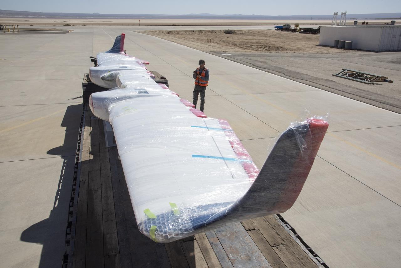 NASAâ€™s X-57 Maxwell, the agencyâ€™s first all-electric X-plane and first crewed X-planed in two decades, is delivered to NASAâ€™s Armstrong Flight Research Center in Edwards, California in its Mod II configuration. The first of three primary modifications for the project, Mod II involves testing of the aircraftâ€™s cruise electric propulsion system. Delivery to NASA from prime contractor Empirical Systems Aerospace of San Luis Obispo, California, marks a major milestone for the project, at which point the vehicle is reintegrated for ground tests, to be followed by taxi tests, and eventually, flight tests. X-57â€™s goal is to further advance the design and airworthiness process for distributed electric propulsion technology for general aviation aircraft, which can provide multiple benefits to efficiency, emissions, and noise.