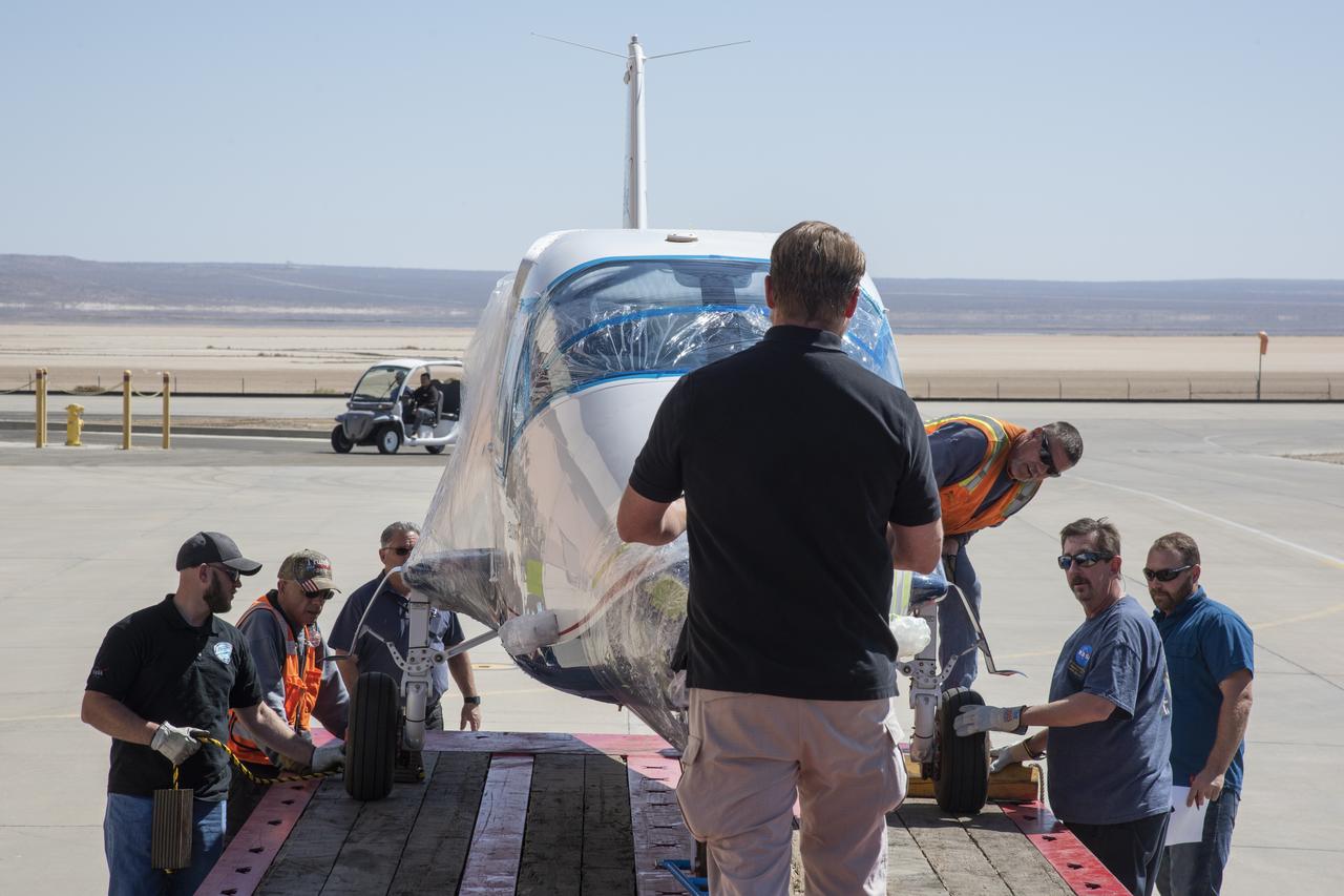 NASA's X-57 Maxwell, the agency's first all-electric X-plane and first crewed X-planed in two decades, is delivered to NASA's Armstrong Flight Research Center in Edwards, California in its Mod II configuration. The first of three primary modifications for the project, Mod II involves testing of the aircraft's cruise electric propulsion system. Delivery to NASA from prime contractor Empirical Systems Aerospace of San Luis Obispo, California, marks a major milestone for the project, at which point the vehicle is reintegrated for ground tests, to be followed by taxi tests, and eventually, flight tests. X-57's goal is to further advance the design and airworthiness process for distributed electric propulsion technology for general aviation aircraft, which can provide multiple benefits to efficiency, emissions, and noise.