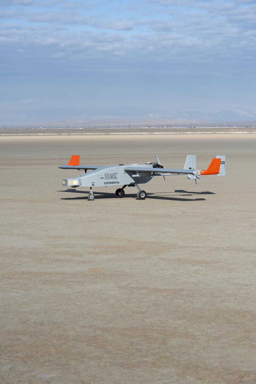 The Navmar Applied Sciences Corporation’s TigerShark sits on the lakebed at Edwards Air Force Base after completing a flight for the Unmanned Aircraft Systems integration in the National Airspace Systems, Flight Test Series Six (FT6) project. FT6 took place at NASA’s Armstrong Flight Research Center in California and focused on low size weight and power sensors for Detect and Avoid (DAA) operations in controlled airspace to inform the FAA through the RTCA Special Committee DAA Working Group on the phase 2 minimum operational performance standards for DAA and air-to-air radar.