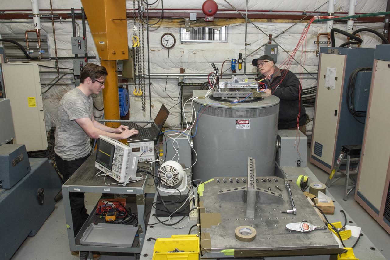 Engineers from NASA's Armstrong Flight Research Center and Empirical Systems Aerospace prepare a cruise motor controller, planned to be used on NASA's all-electric X-57 Maxwell, for vibration testing at Armstrong's environmental lab. Testing the cruise motor controller at various vibration levels, based on baseline flight testing in the project's first phase, helps ensure that the hardware will withstand similar vibration in flight conditions. X-57, NASA's first all-electric experimental aircraft, or X-plane, will fly in its first all-electric configuration in 2020.