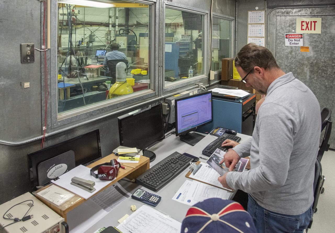 Engineers monitor data during vibration testing of a cruise motor controller for the X-57 Maxwell, NASA’s first all-electric X-plane. Attached to a table at NASA Armstrong Flight Research Center’s environmental lab, the cruise motor controller is exposed to specific levels of vibration, allowing NASA to examine the structural integrity of the hardware. Engineers, meanwhile, monitored data, including waveforms of electrical current, and recorded readings.