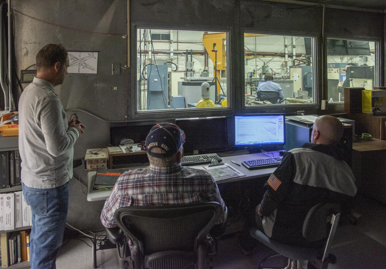 Engineers monitor data during vibration testing of a cruise motor controller for the X-57 Maxwell, NASA's first all-electric X-plane. Attached to a table at NASA Armstrong Flight Research Center's environmental lab, the cruise motor controller is exposed to specific levels of vibration, allowing NASA to examine the structural integrity of the hardware. Engineers, meanwhile, monitored data, including waveforms of electrical current, and recorded readings.