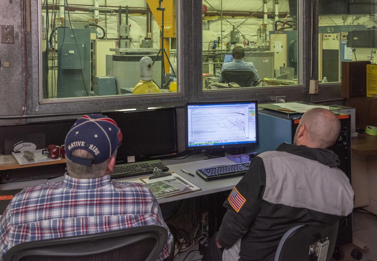 Engineers monitor data during vibration testing of a cruise motor controller for the X-57 Maxwell, NASA’s first all-electric X-plane. Attached to a table at NASA Armstrong Flight Research Center’s environmental lab, the cruise motor controller is exposed to specific levels of vibration, allowing NASA to examine the structural integrity of the hardware. Engineers, meanwhile, monitored data, including waveforms of electrical current, and recorded readings.