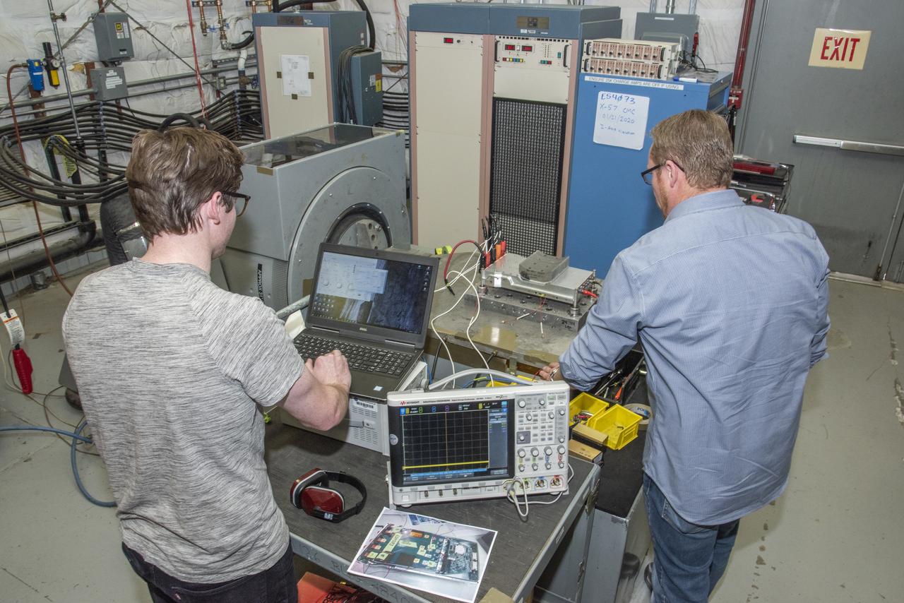 Engineers from NASA's Armstrong Flight Research Center and Empirical Systems Aerospace prepare a cruise motor controller, planned to be used on NASA's all-electric X-57 Maxwell, for vibration testing at Armstrong's environmental lab. Testing the cruise motor controller at various vibration levels, based on baseline flight testing in the project's first phase, helps ensure that the hardware will withstand similar vibration in flight conditions. X-57, NASA's first all-electric experimental aircraft, or X-plane, will fly in its first all-electric configuration in 2020.