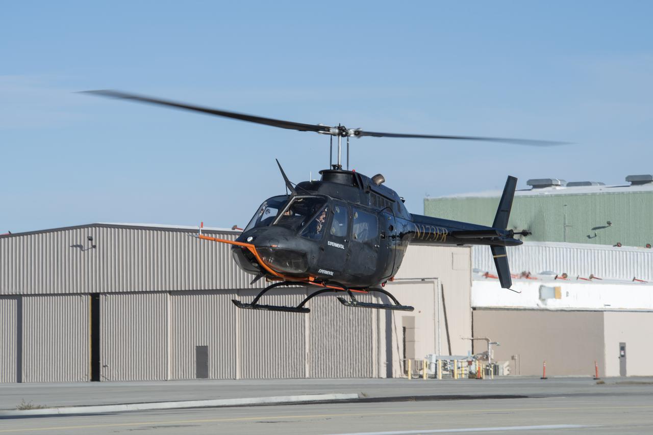 A Bell OH-58C Kiowa helicopter provided by Flight Research Inc. in Mojave, California, prepares to land at NASA’s Armstrong Flight Research Center in California the first week of December 2020. The Advanced Air Mobility National Campaign project used the helicopter as a surrogate urban air mobility vehicle to develop a data baseline for future flight testing. 