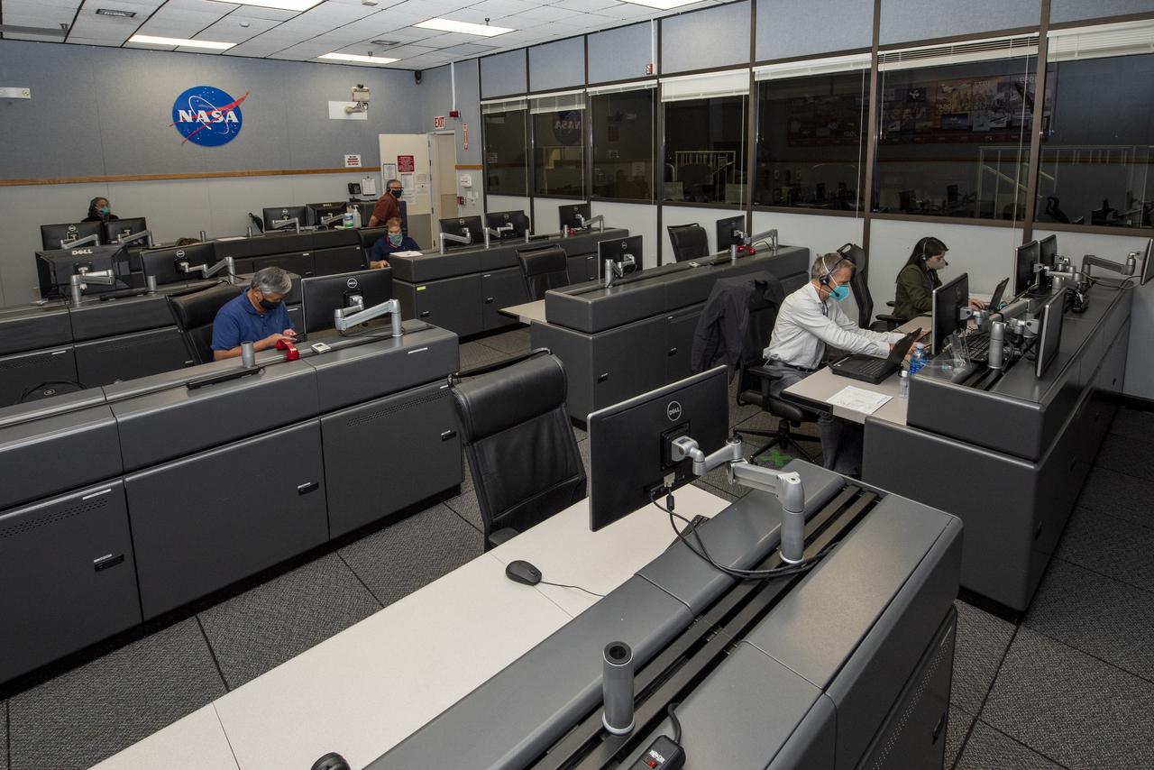 Ames Research Center researchers on the Advanced Air Mobility National Campaign project's Airspace Test Infrastructure (ATI) team monitor surveillance data and metrics from the helicopter in real time during the NC Integrated Dry Run Test team the first week of December 2020 at NASA's Armstrong Flight Research Center in California.