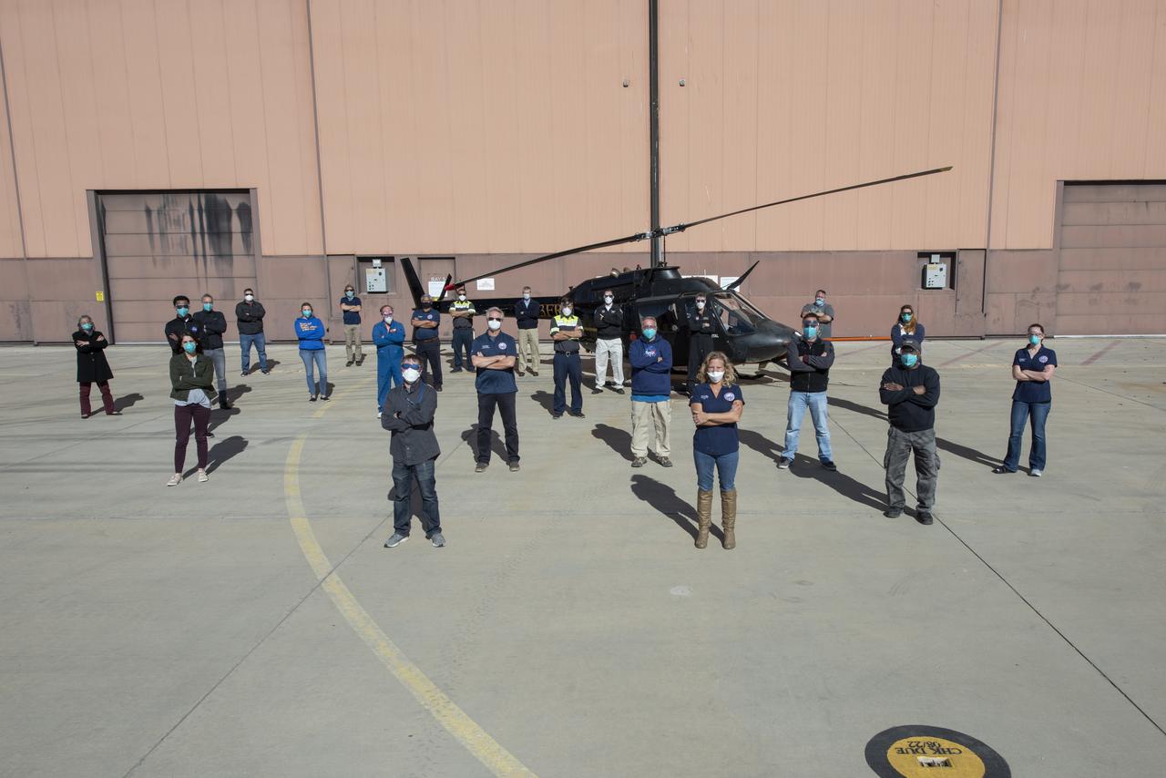 The Advanced Air Mobility National Campaign project’s NC Integrated Dry Run Test team is pictured in front of a Bell OH-58C Kiowa helicopter provided by Flight Research Inc. in Mojave, California the first week of December 2020 at NASA’s Armstrong Flight Research Center in California. 