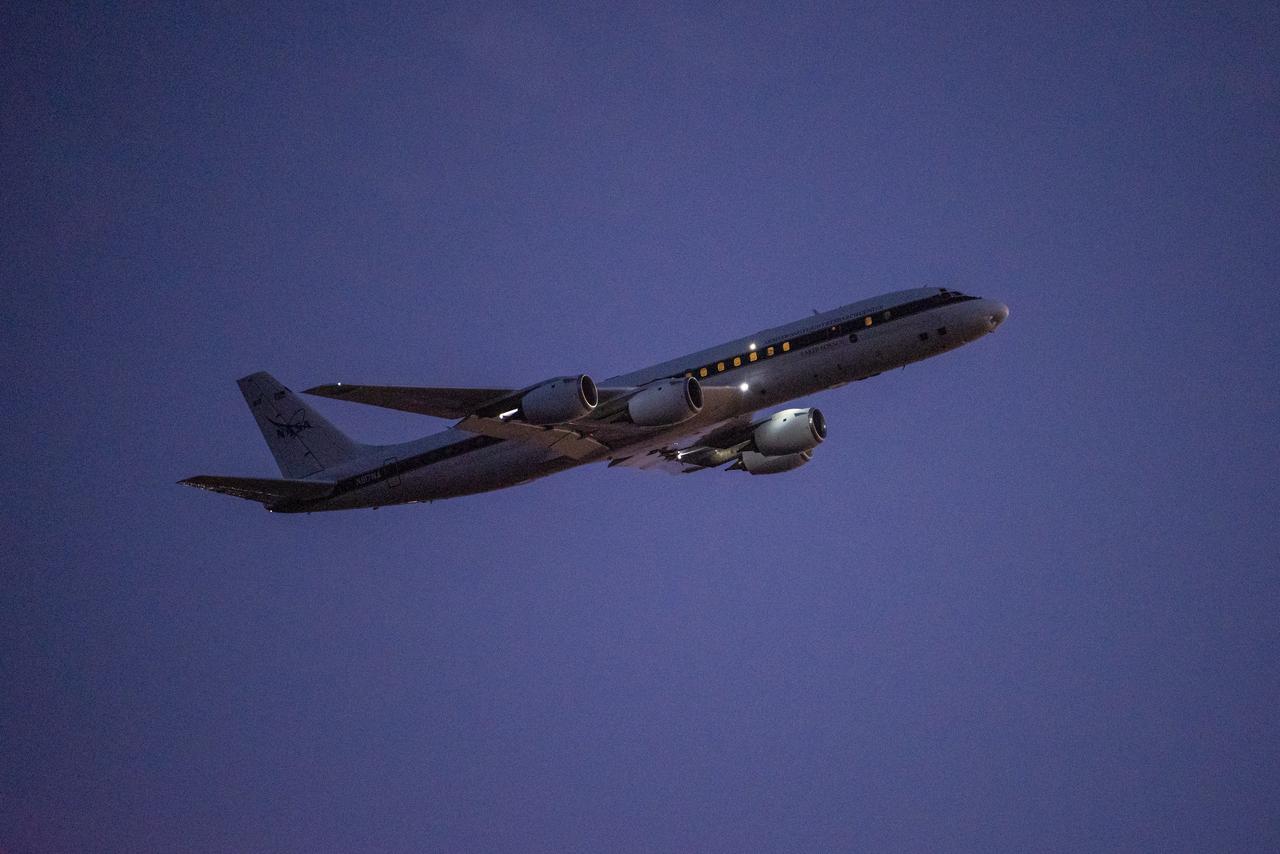 DC-8 lifts off from Air Force Plant 42 in Palmdale, Calif., at sunset.