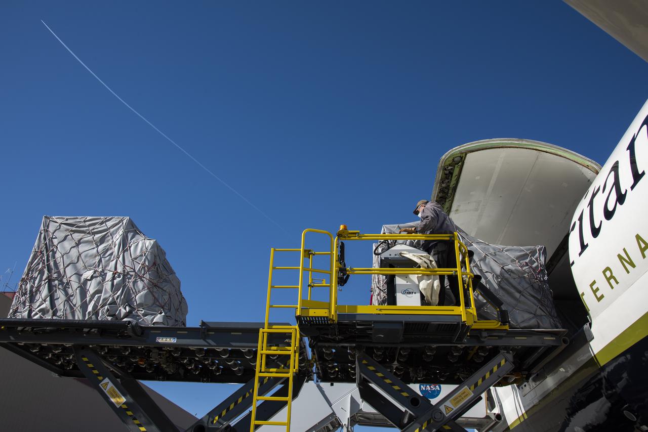 NASA and Samaritan's Purse DC-8 aircrafts met on the ramp in front of NASA's Armstrong Flight Research Center Building 703.
