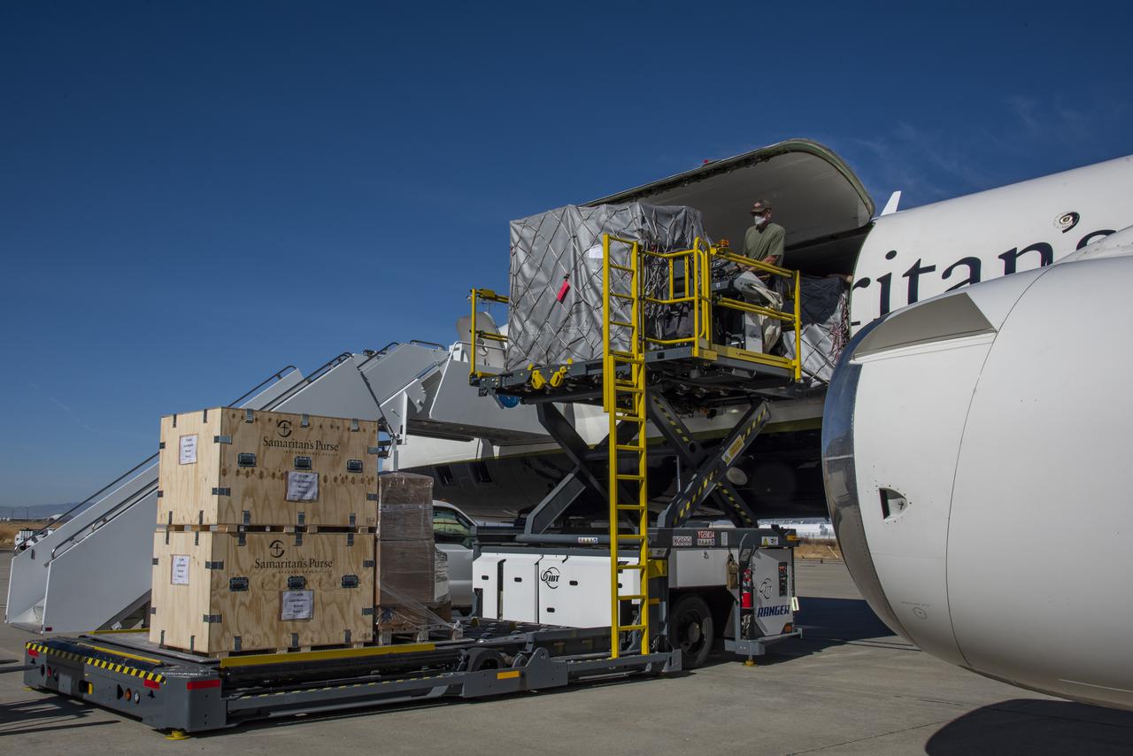 Samaritan Purse landed its DC-8 at NASA's Armstrong Flight Research Center Building 703 in Palmdale, California, to deliver supplies needed to meet the demands of the COVID-19 pandemic. NASA Armstrong personnel assisted in unloading the aircraft.
