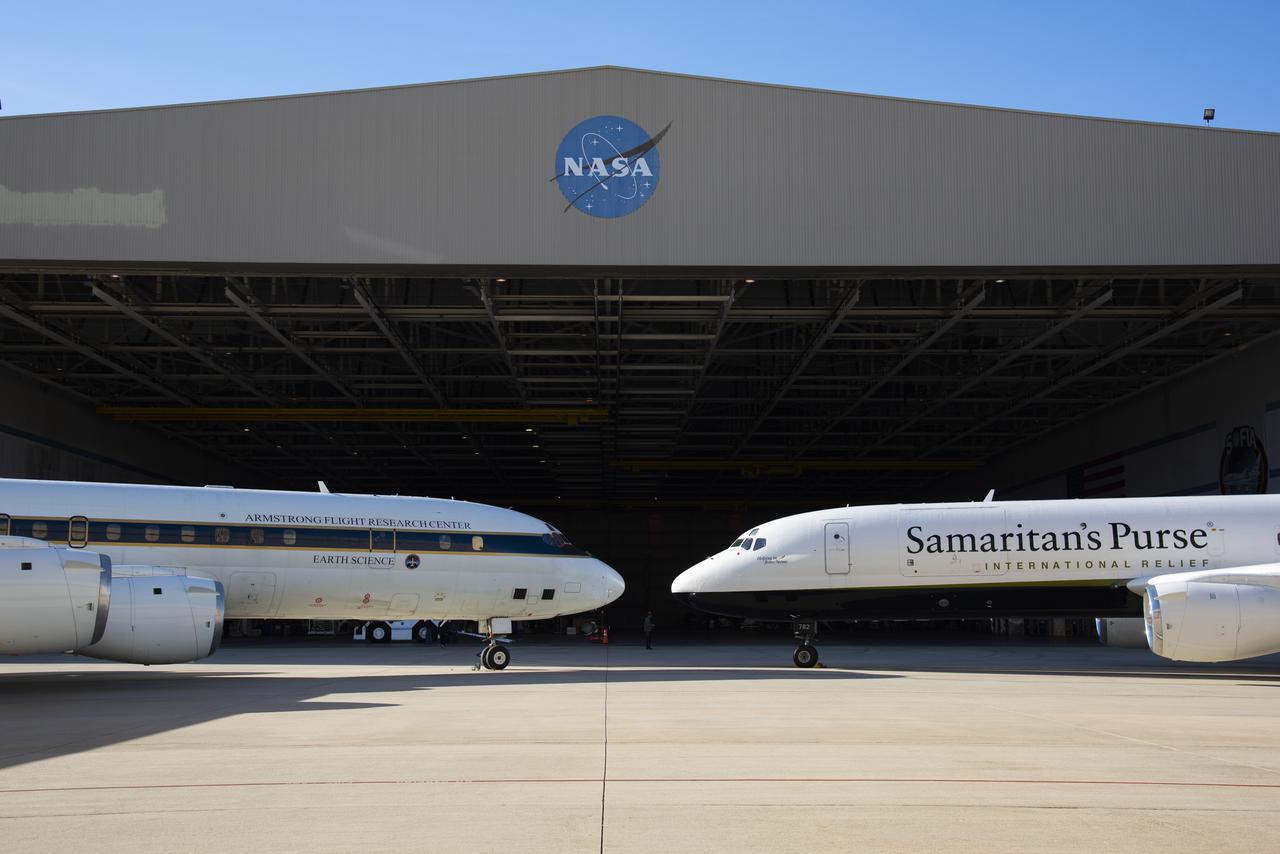 NASA and Samaritan's Purse DC-8 aircrafts met on the ramp in front of NASA's Armstrong Flight Research Center Building 703.