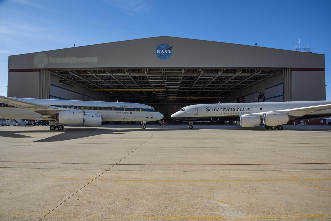  NASA and Samaritan’s Purse DC-8 aircrafts met on the ramp in front of NASA’s Armstrong Flight Research Center Building 703.