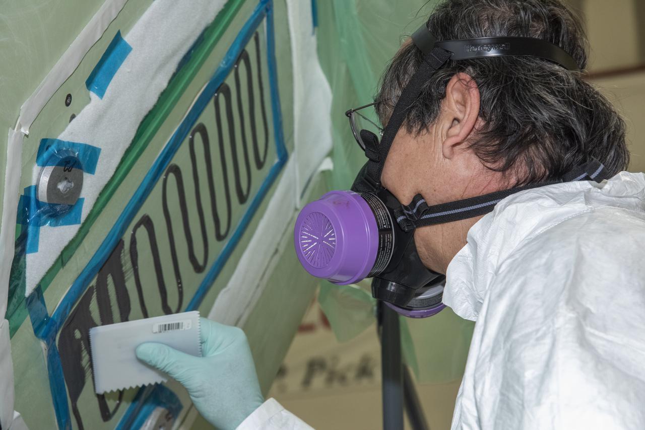 The load pad bonding process for the vertical tails was a preliminary step in the process to test the F/A-18E from the Naval Air Systems Command (NAVAIR) in Patuxent River, Maryland. The aircraft is in NASAâ€™s Armstrong Flight Research Center Flight Loads Laboratory in Edwards, California, for the centerâ€™s biggest load calibrations tests. This testing is needed before the aircraft can serve as a test vehicle for determining if it can safely manage maneuvers and proposed upgrades. 