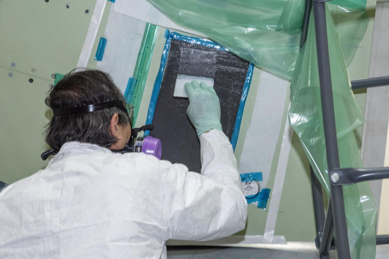 The load pad bonding process for the vertical tails was a preliminary step in the process to test the F/A-18E from the Naval Air Systems Command (NAVAIR) in Patuxent River, Maryland. The aircraft is in NASAâ€™s Armstrong Flight Research Center Flight Loads Laboratory in Edwards, California, for the centerâ€™s biggest load calibrations tests. This testing is needed before the aircraft can serve as a test vehicle for determining if it can safely manage maneuvers and proposed upgrades. 