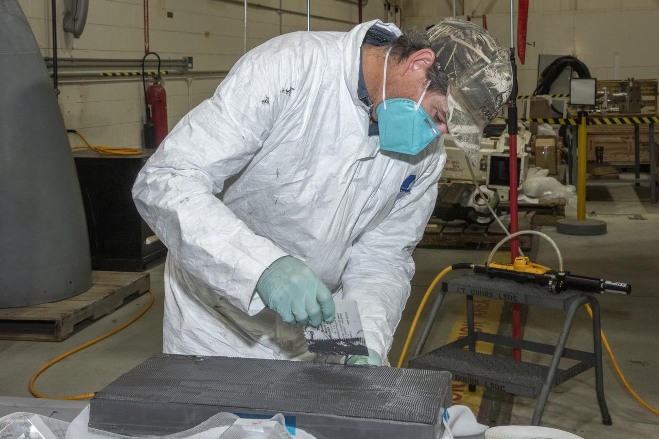 The load pad bonding process for the vertical tails was a preliminary step in the process to test the F/A-18E from the Naval Air Systems Command (NAVAIR) in Patuxent River, Maryland. The aircraft is in NASA’s Armstrong Flight Research Center Flight Loads Laboratory in Edwards, California, for the center’s biggest load calibrations tests. This testing is needed before the aircraft can serve as a test vehicle for determining if it can safely manage maneuvers and proposed upgrades. 