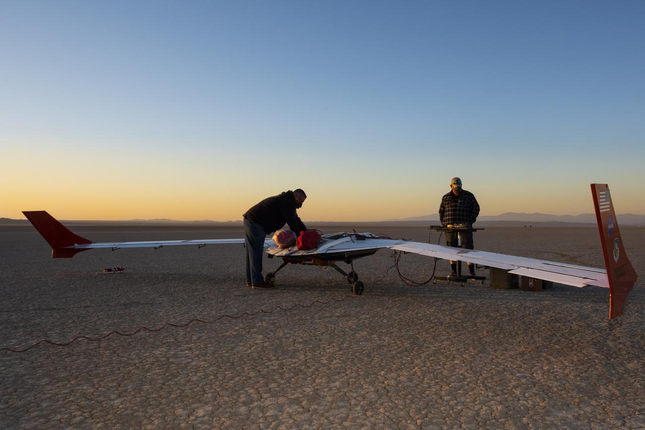 The X-56B remotely piloted aircraft ground crew prepares the aircraft to begin a new flight series. The flight was April 19 at NASA's Armstrong Flight Research Center in Edwards, California, with partner Northrop Grumman.