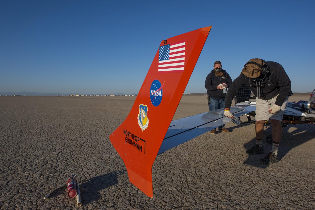 The X-56B remotely piloted aircraft ground crew prepares the aircraft to begin a new flight series. The flight was April 19 at NASA's Armstrong Flight Research Center in Edwards, California, with partner Northrop Grumman.