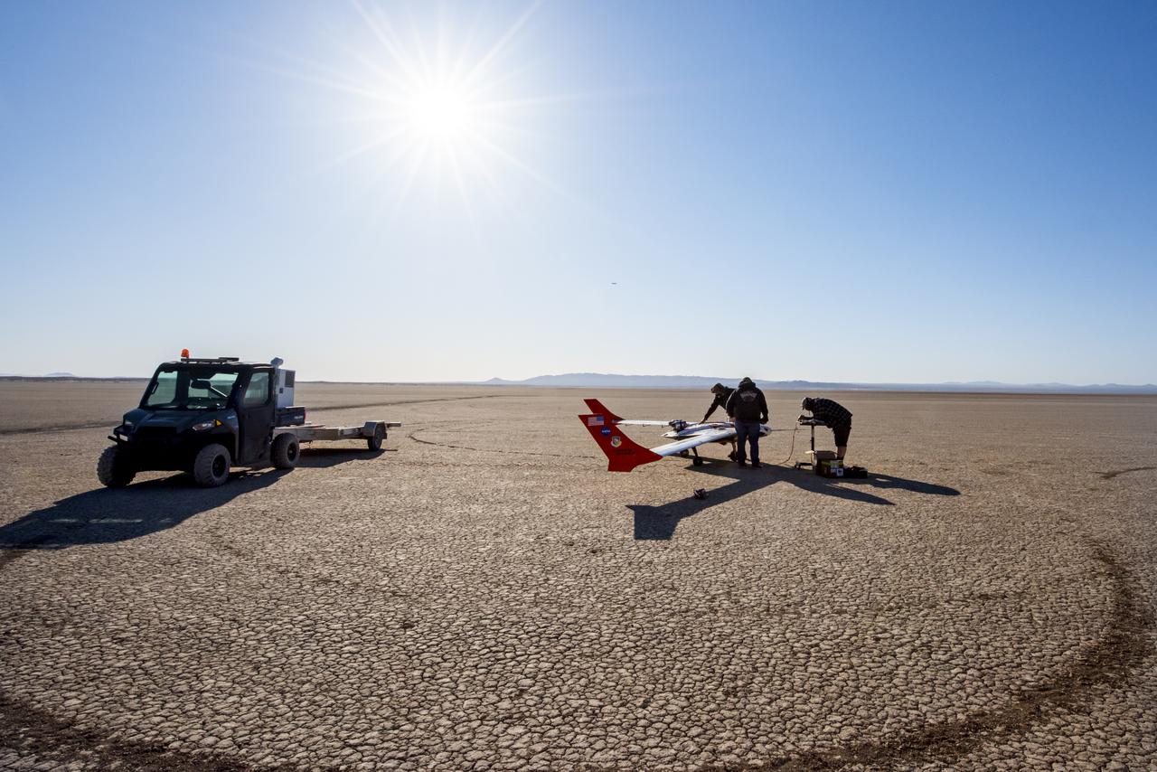 The X-56B remotely piloted aircraft ground crew prepares the aircraft to begin a new flight series. The flight was April 19 at NASA's Armstrong Flight Research Center in Edwards, California, with partner Northrop Grumman.