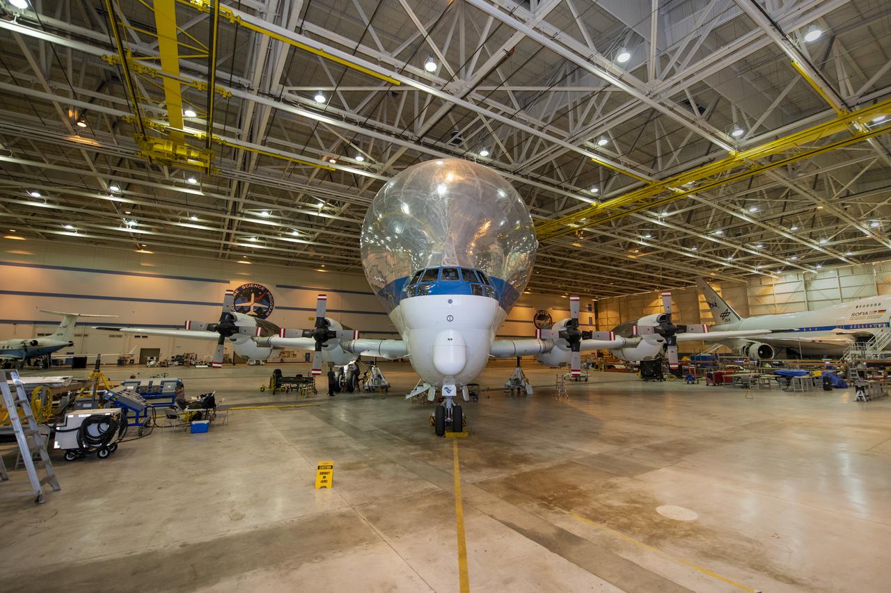 NASA’s Super Guppy Turbine cargo aircraft in the hangar at NASA’s Armstrong Flight Research Center on August 24, 2021. This unique whale-like aircraft arrived at the center’s Building 703 in Palmdale, CA to support crews in the performance of routine maintenance. The Super Guppy aircraft, operated by NASA’s Johnson Space Center, aids in the transportation of oversized aerospace cargo in a practical and economical way.