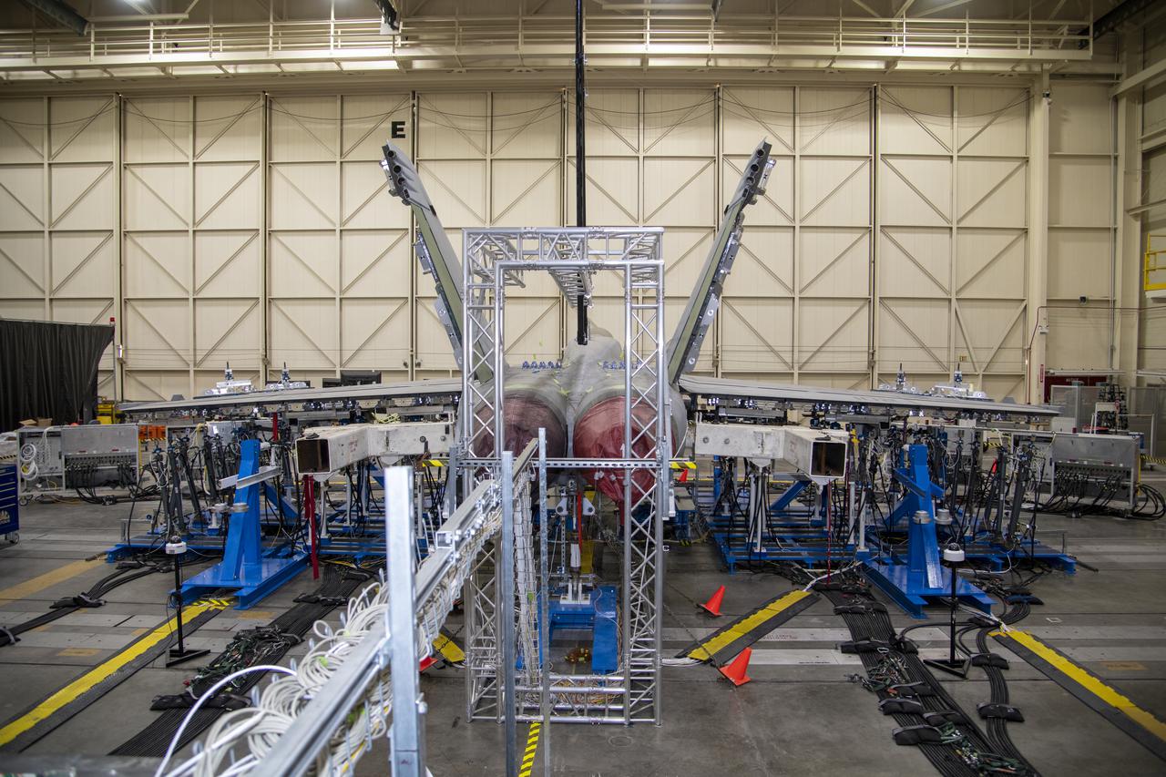 NASA’s Armstrong Flight Research Center Flight Loads Laboratory in Edwards, California, is working on one of its biggest load calibrations tests on an F/A-18E Super Hornet from the Naval Air Systems Command (NAVAIR) in Patuxent River, Maryland. This testing is needed before the aircraft can serve as a test vehicle for determining if it can safely manage maneuvers and proposed upgrades. This is a view of the test setup for the wing loads testing that is set to begin in December 2021.