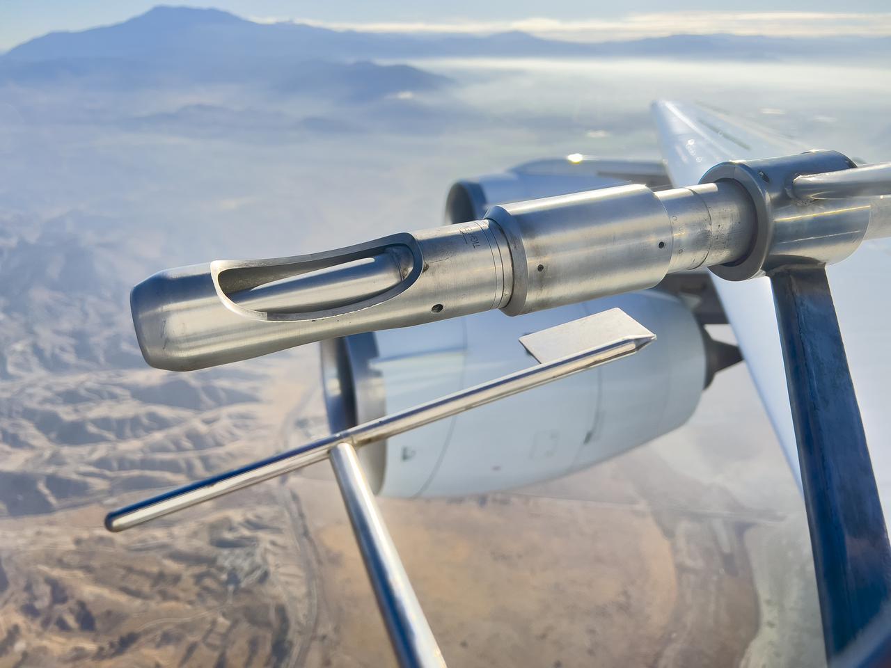 NASA's DC-8 in flight for the NASA Student Airborne Research Project (SARP) to measure aerosols with the Langley Aerosol Research Group Experiment (LARGE) instrument with the Cavity Attenuated Phase Shift (CAPS) PMex Monitor (Particle Optical Extinction).
