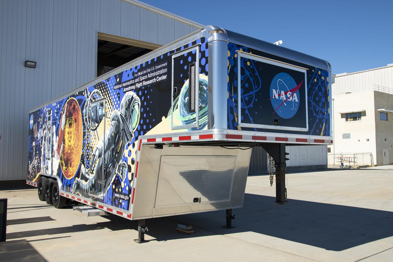 The Mobile Fabrication Shop was received at NASA Armstrong on February 7, 2022 as part of the Robotics Alliance Program based at NASAâ€™s Johnson Space Center. This view shows the front of the wrapped trailer that attends robotics competitions to help students during their robotics competitions. 