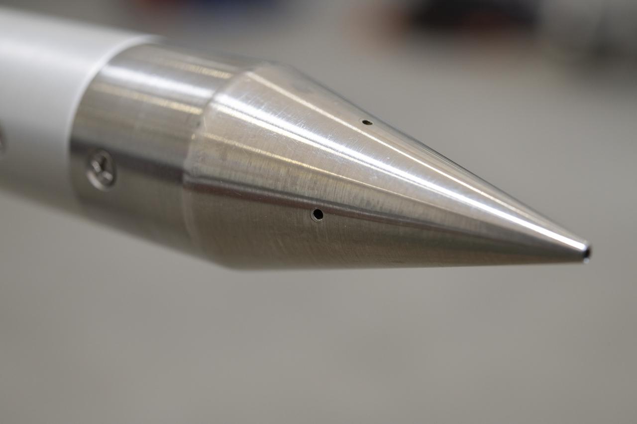 A close-up of NASA’s shock-sensing probe highlights its pressure ports, designed to measure air pressure changes during supersonic flight. The probe will be mounted on NASA’s F-15B Aeronautics Research Test Bed for calibration flights, validating its ability to measure shock waves generated by the X-59 as part of NASA's Quesst mission.